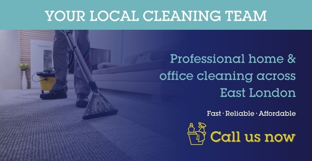 Cleaning East London cleaner wiping down a kitchen worktop in a flat in the E postcode area